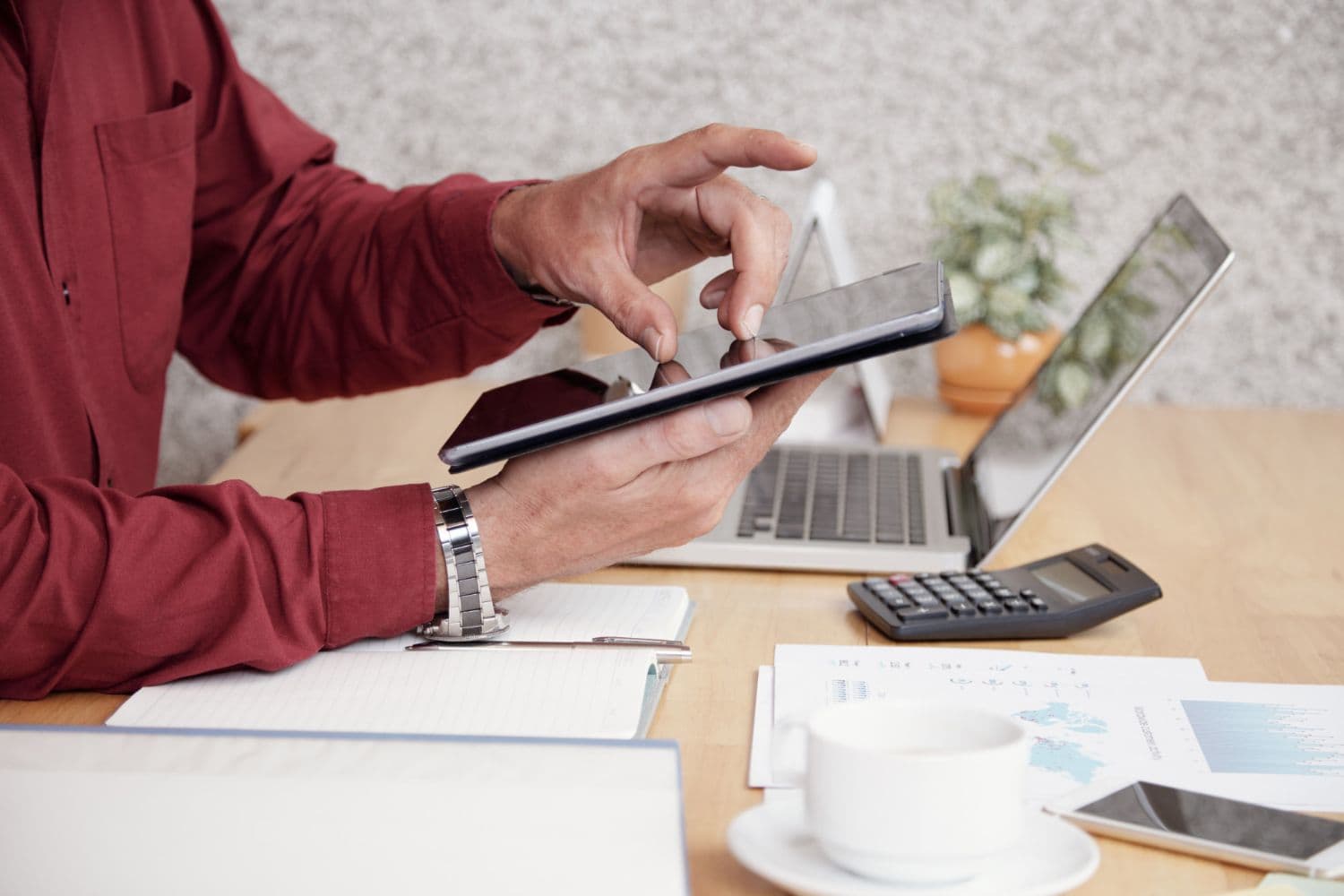 businessman-working-with-touchpad-handle-xero